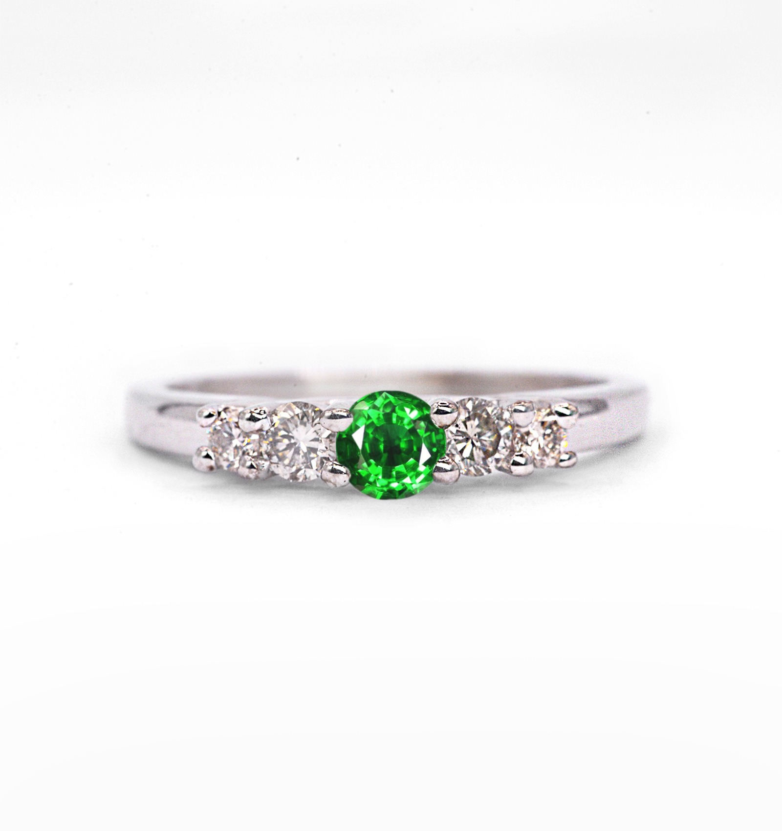 Green tsavorite and diamond ring with natural 4mm green tsavorite and white diamonds. This unique style ring comes with solid 9k,14k or 18k gold or platinum.