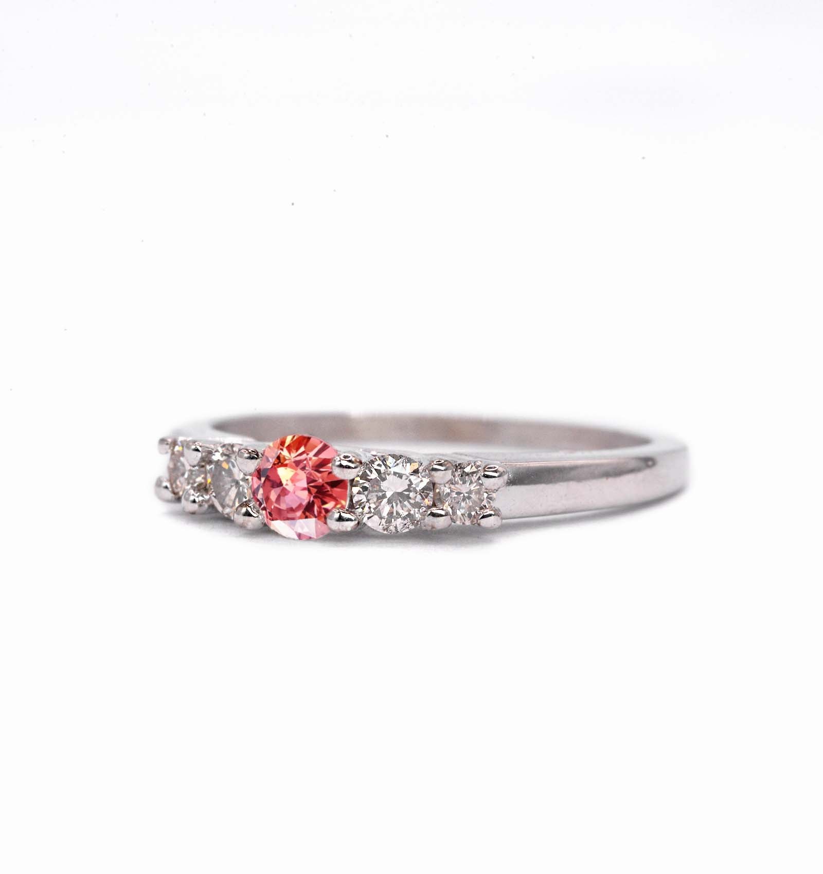 Padparadscha sapphire and diamond ring for her with padparadscha sapphire and white diamonds. This unique ring comes in 9k,14k or 18k rose gold.