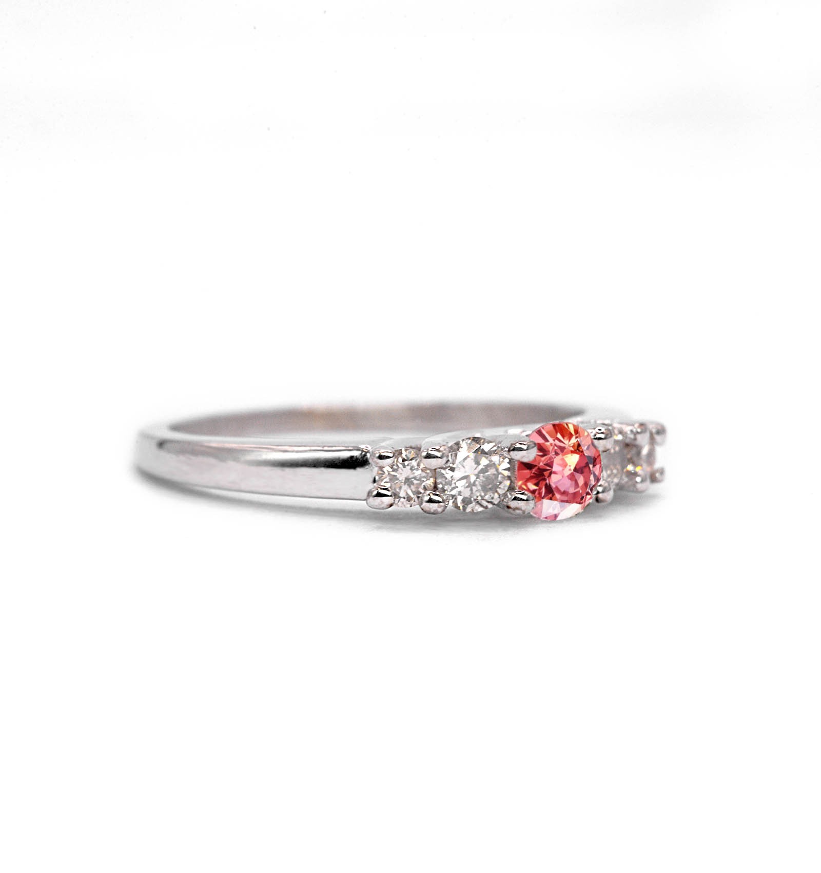 Padparadscha sapphire and diamond ring for her with padparadscha sapphire and white diamonds. This unique ring comes in 9k,14k or 18k rose gold.
