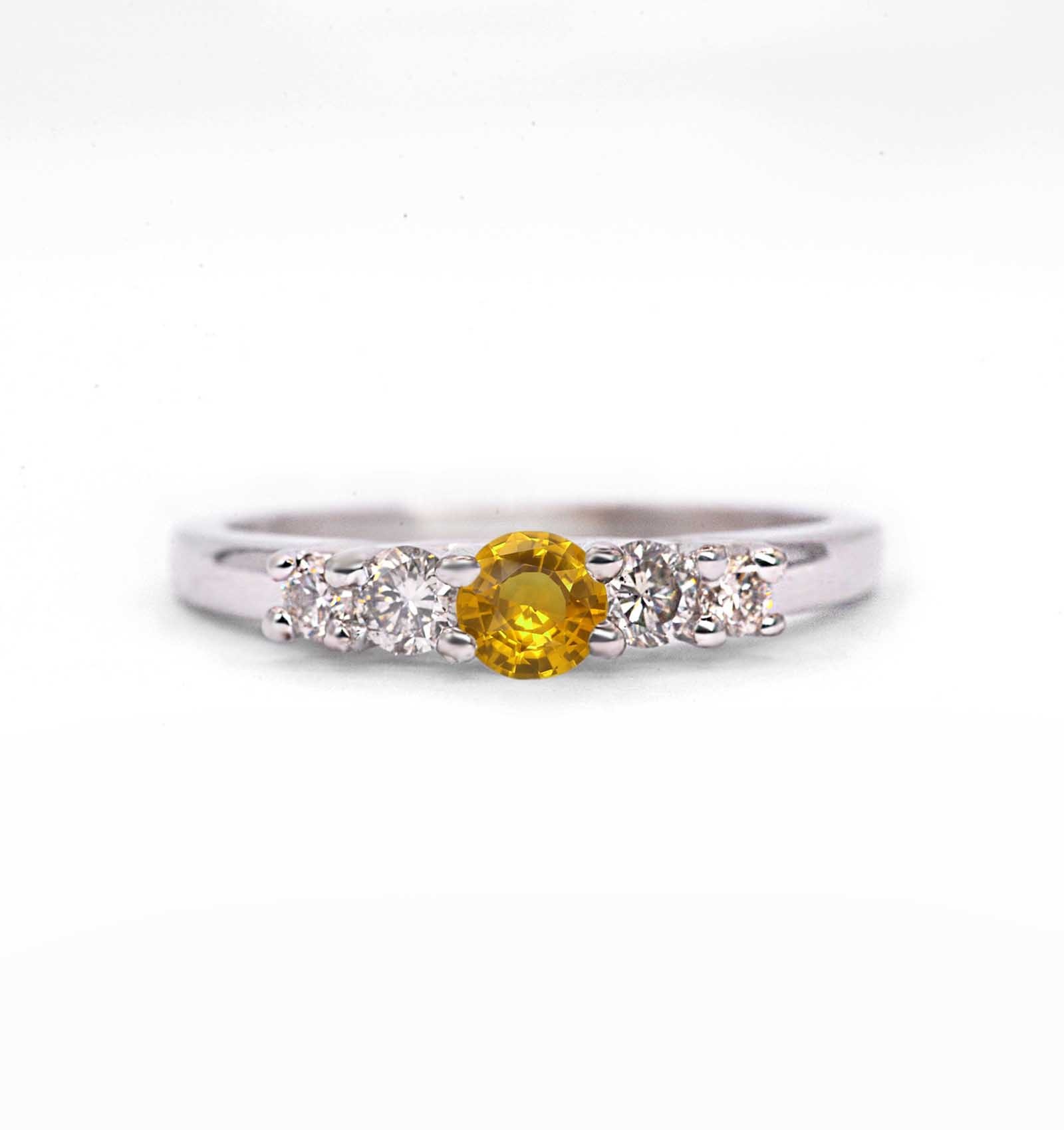 Yellow sapphire and diamond ring for her with yellow sapphire and white diamonds. This unique ring comes in 9k,14k or 18k rose gold.