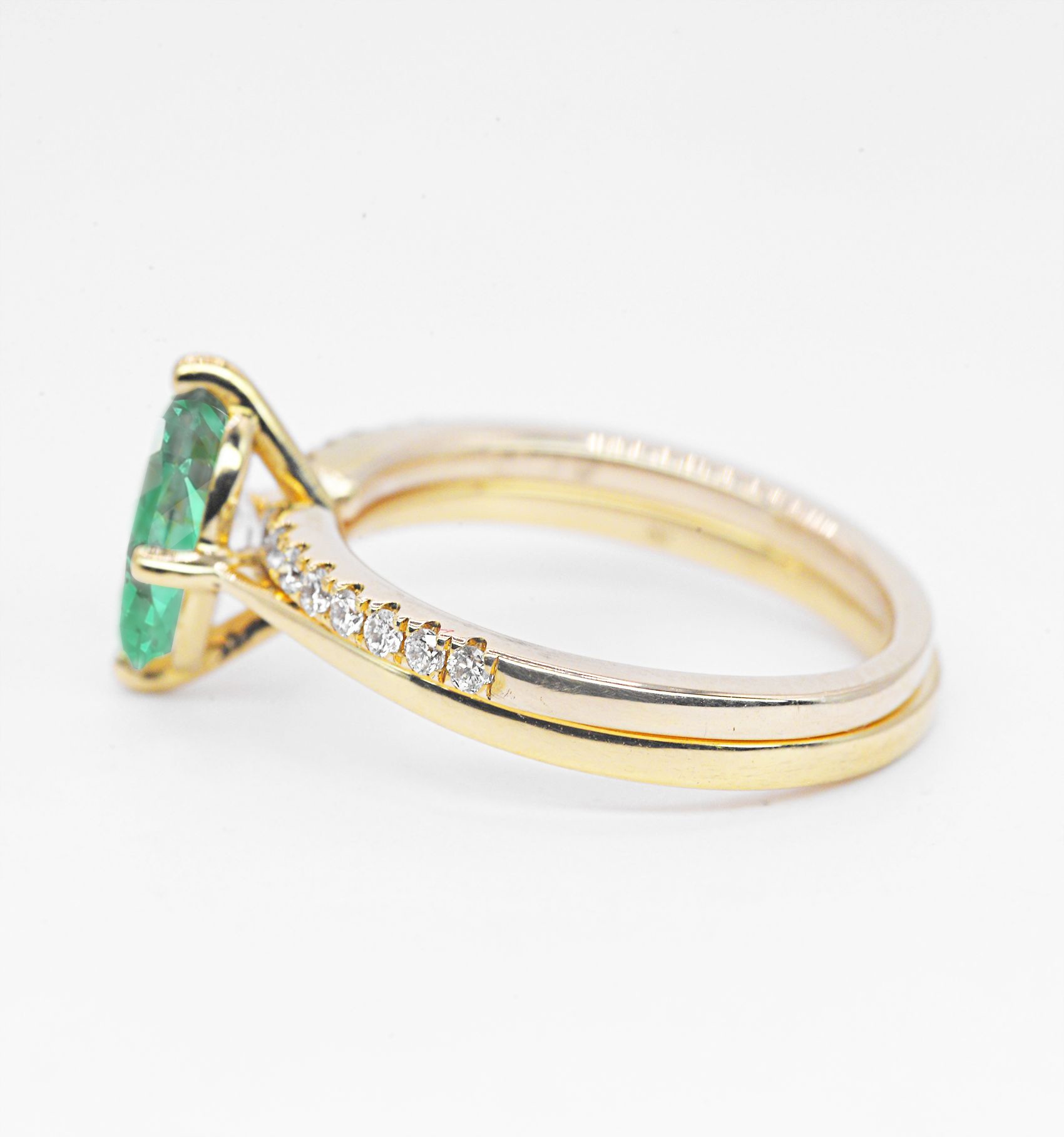 oval emerald ring with wedding band