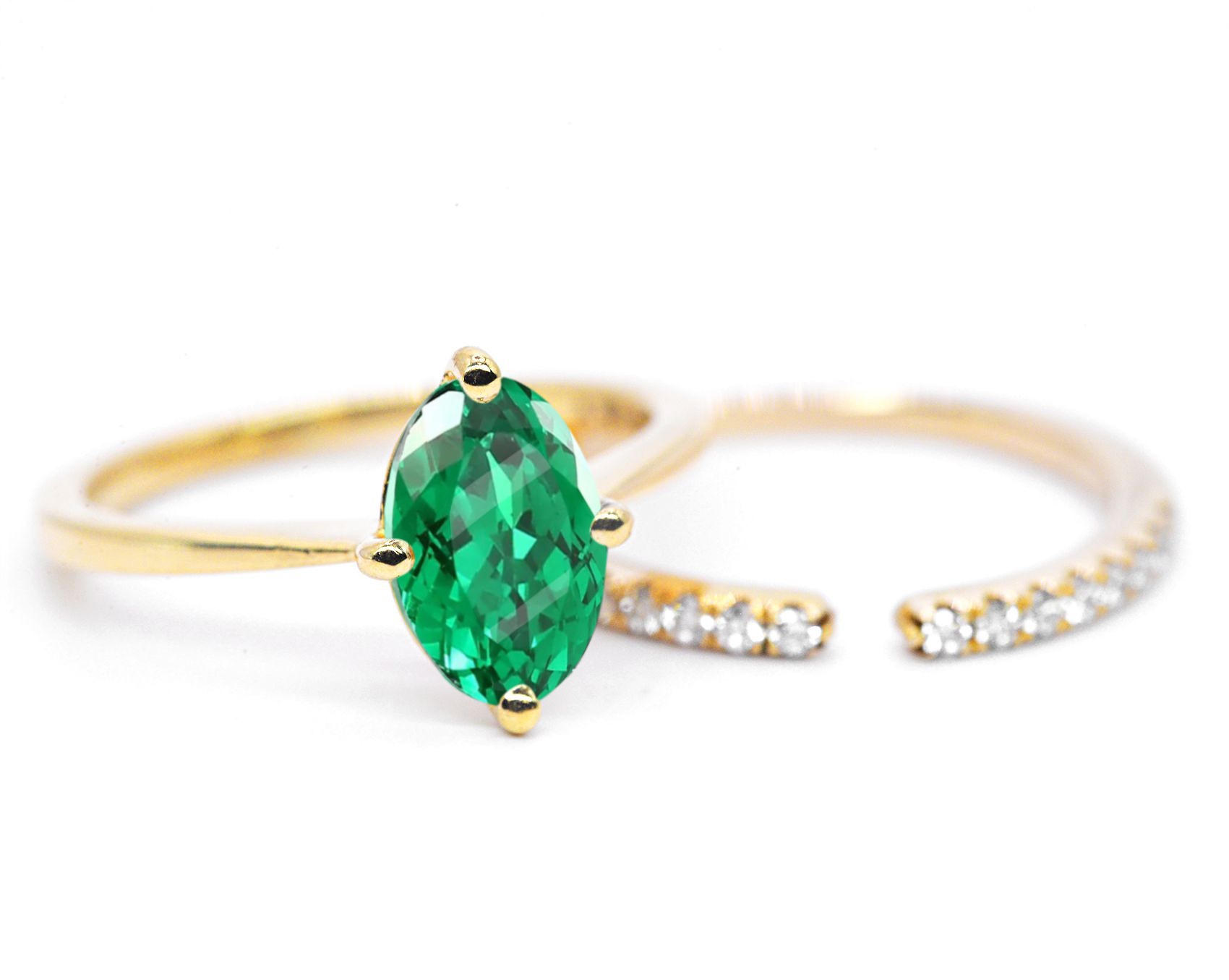oval emerald ring with wedding band