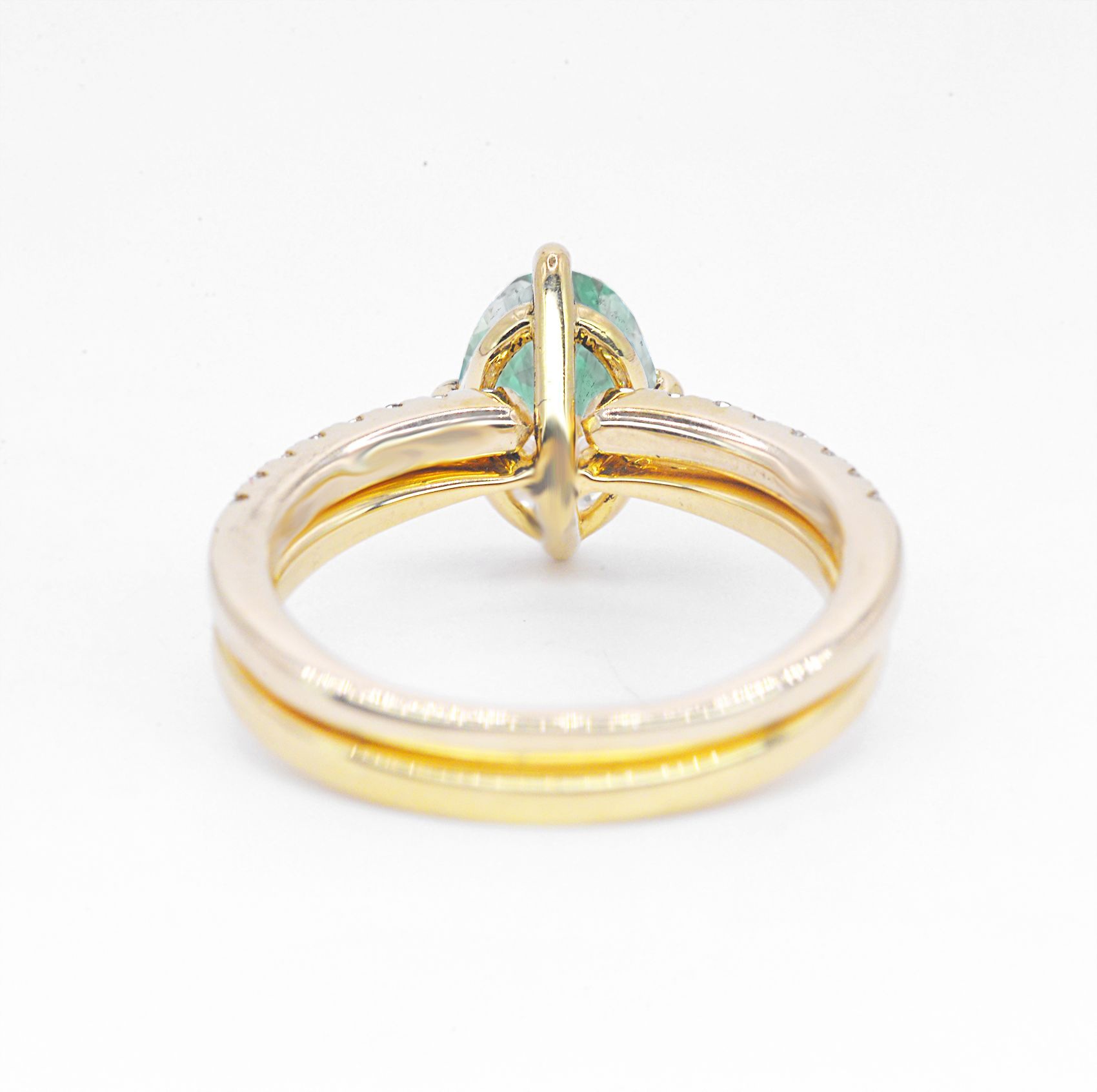oval emerald ring with wedding band