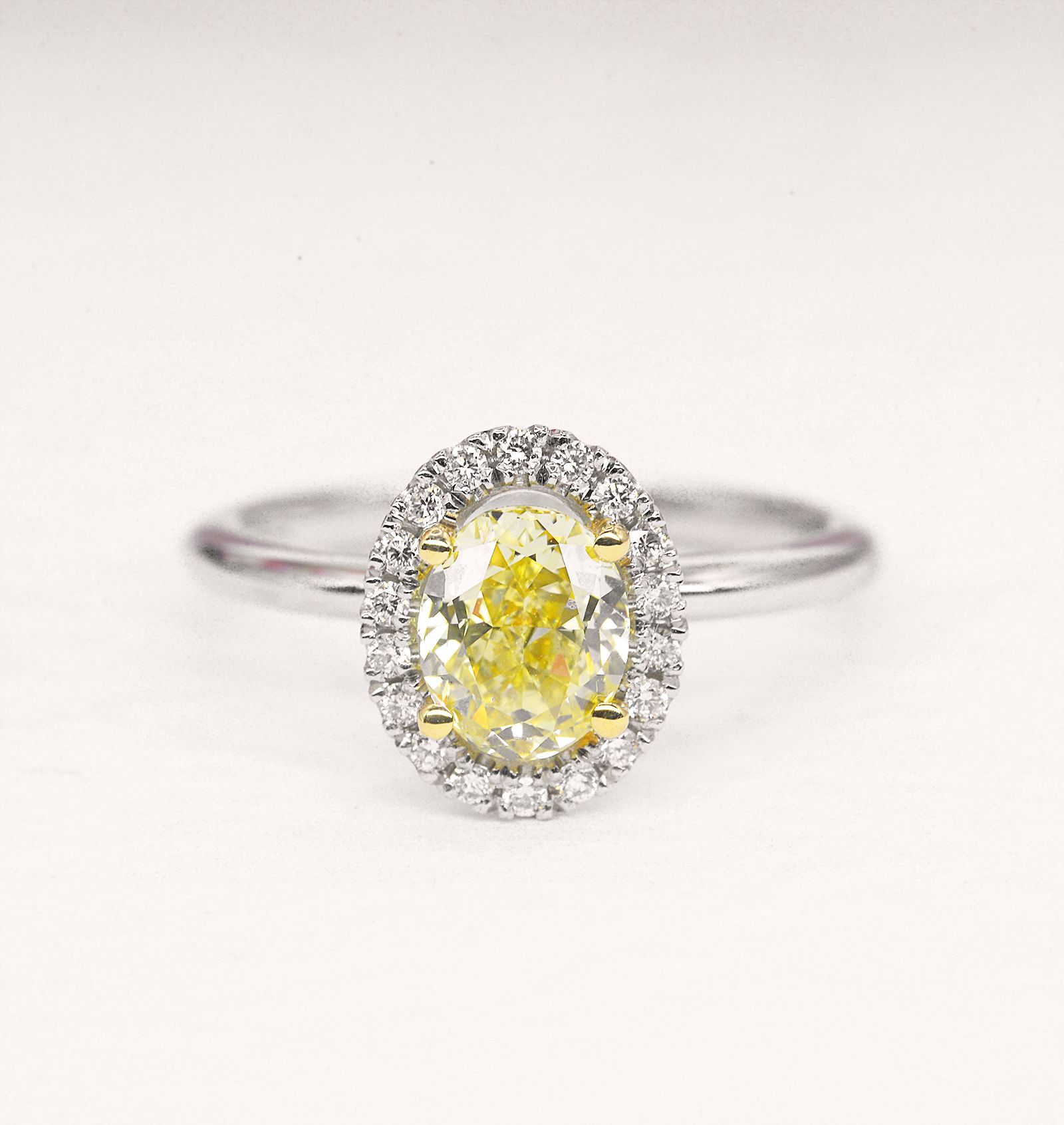 Natural Oval Yellow Diamond Halo Engagement Ring