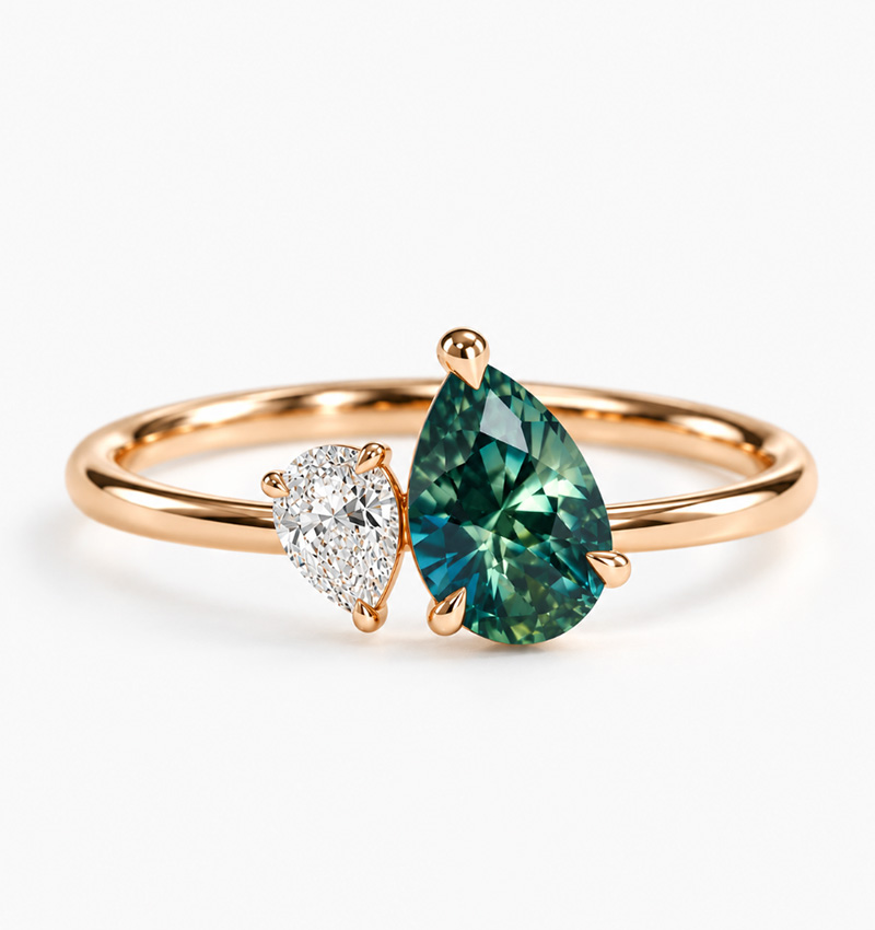 Teal sapphire and diamond toi et moi engagement ring